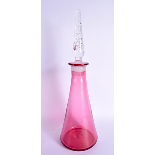 383 - A LARGE VINTAGE CRANBERRY GLASS DECANTER with six glasses. Largest 41 cm high. (7)