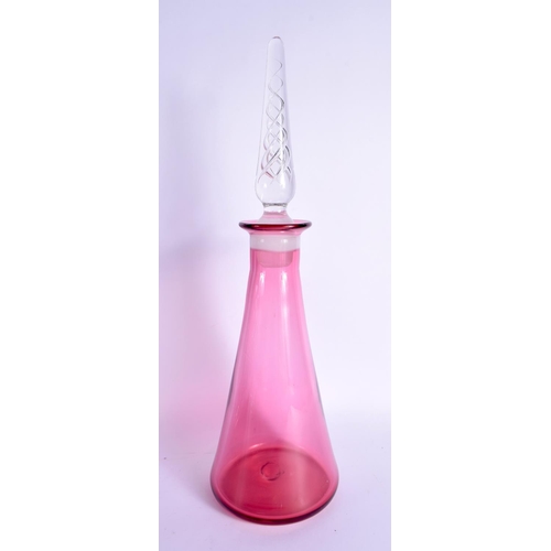 383 - A LARGE VINTAGE CRANBERRY GLASS DECANTER with six glasses. Largest 41 cm high. (7)
