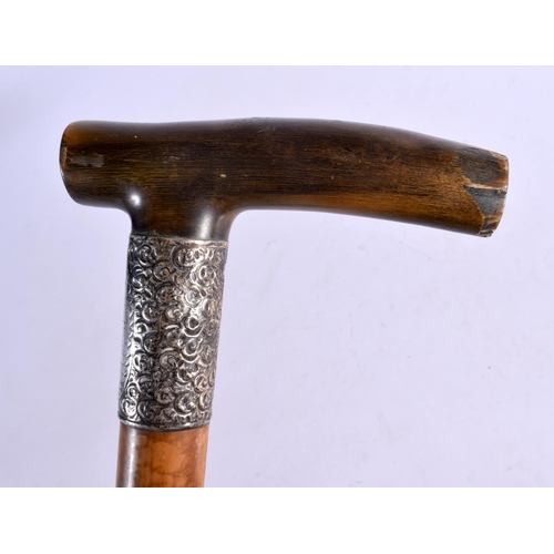 387 - A 19TH CENTURY MIDDLE EASTERN CARVED RHINOCEROS HORN WALKING CANE. 90 cm long.
