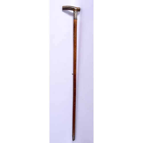 387 - A 19TH CENTURY MIDDLE EASTERN CARVED RHINOCEROS HORN WALKING CANE. 90 cm long.