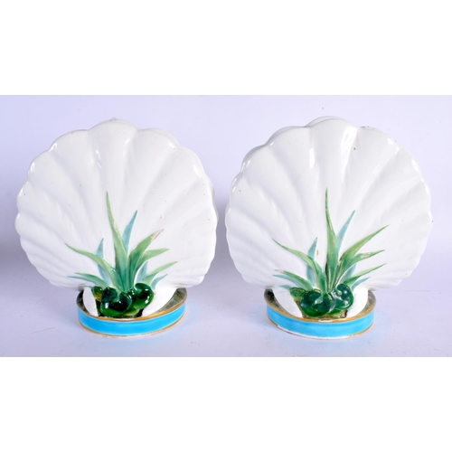391 - A RARE PAIR OF 19TH CENTURY MINTON PORCELAIN POSY HOLDERS formed as seated doves. 16 cm x 12 cm.