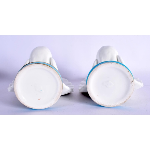391 - A RARE PAIR OF 19TH CENTURY MINTON PORCELAIN POSY HOLDERS formed as seated doves. 16 cm x 12 cm.