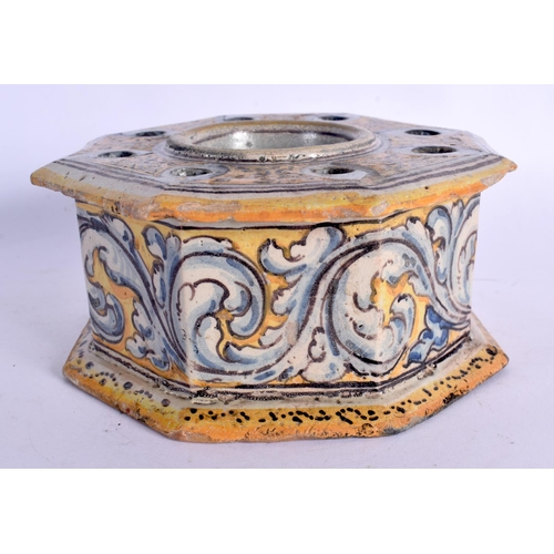 393 - A FINE 17TH/18TH CENTURY EUROPEAN FAIENCE OCTAGONAL INKWELL painted with scrolling foliage and vines... 