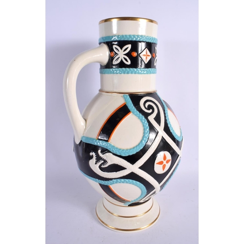395 - A STYLISH ARTS AND CRAFTS DRESSER STYLE POTTERY JUG decorated with motifs. 34 cm x 14 cm.
