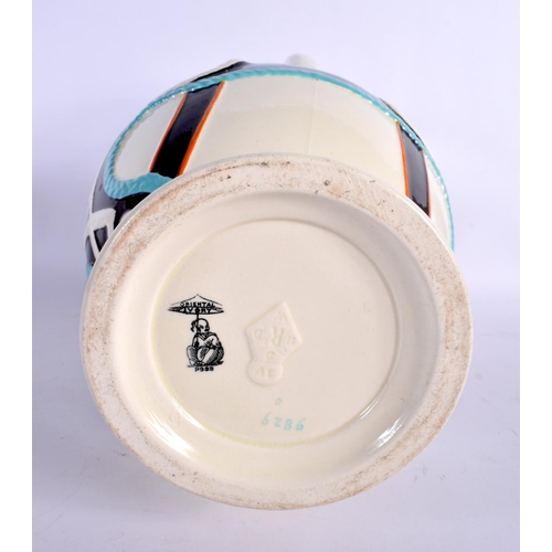 395 - A STYLISH ARTS AND CRAFTS DRESSER STYLE POTTERY JUG decorated with motifs. 34 cm x 14 cm.