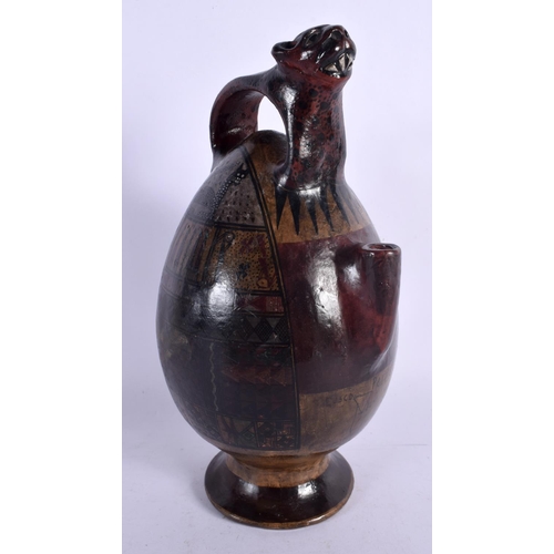 396 - A SOUTH AMERICAN PAINTED PERUVIAN CUSCO POTTERY EWER painted with cats and motifs. 26 cm high.