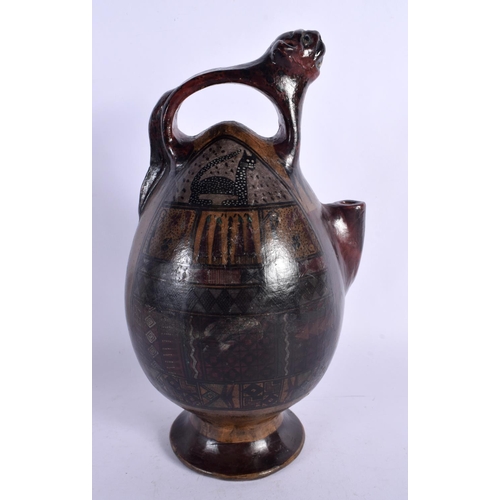 396 - A SOUTH AMERICAN PAINTED PERUVIAN CUSCO POTTERY EWER painted with cats and motifs. 26 cm high.