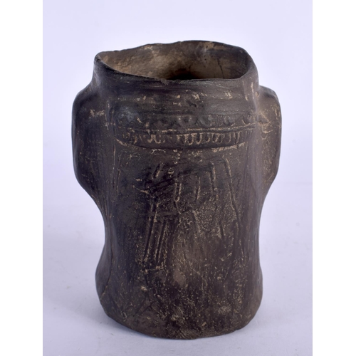 397 - A SOUTH AMERICAN POTTERY VESSEL modelled as a female. 11 cm x 8 cm.
