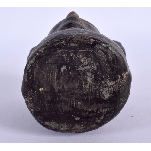397 - A SOUTH AMERICAN POTTERY VESSEL modelled as a female. 11 cm x 8 cm.