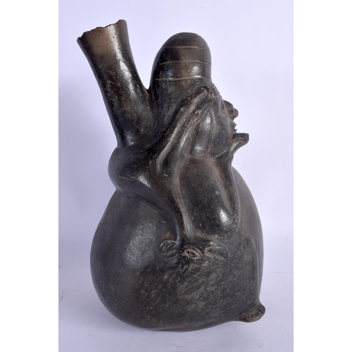 403 - A RARE EARLY SOUTH AMERICAN CARVED AND PAINTED TERRACOTTA VESSEL modelled as a chubby female holding... 