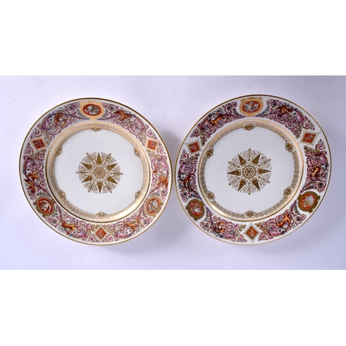 412 - A PAIR OF LATE 19TH CENTURY SEVRES PORCELAIN CABINET PLATES painted with crests and associated folia... 