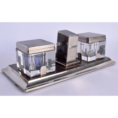 413 - AN UNUSUAL 1940S ART DECO CHROME AND BAKELITE DESK STAND with glass inkwells. 20 cm x 9 cm.