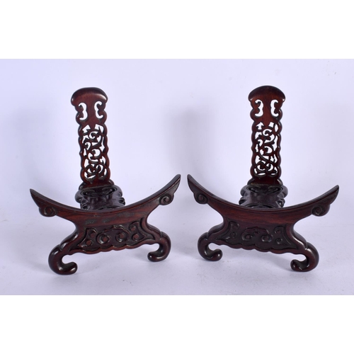 414 - A PAIR OF 19TH CENTURY CHINESE CARVED HARDWOOD PLATE STANDS Qing. 11 cm x 13 cm.