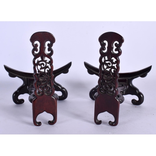 414 - A PAIR OF 19TH CENTURY CHINESE CARVED HARDWOOD PLATE STANDS Qing. 11 cm x 13 cm.