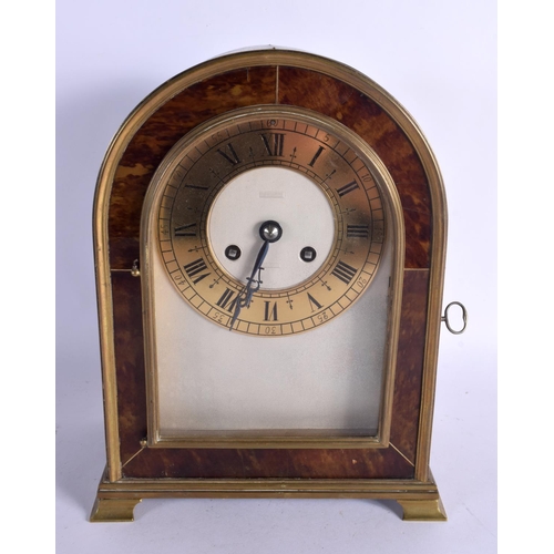416 - A 19TH CENTURY EUROPEAN TORTOISESHELL MOUNTED BRACKET CLOCK with gilt metal dial. 28 cm x 18 cm.