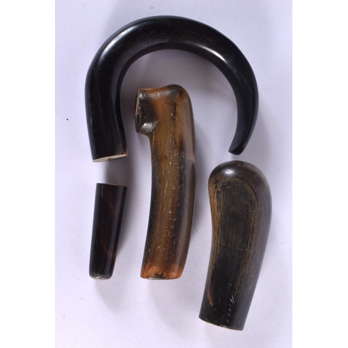 419 - FOUR 19TH CENTURY MIDDLE EASTERN CARVED RHINOCEROS HORN WALKING CANE HANDLES. 262 grams. 10.5 cm x 8... 