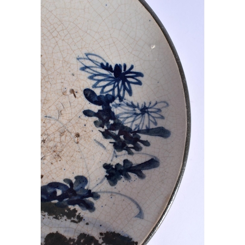 48 - A RARE EARLY 18TH/19TH CENTURY JAPANESE EDO MINGEI SETO POTTERY DISH painted with sparse foliage and... 