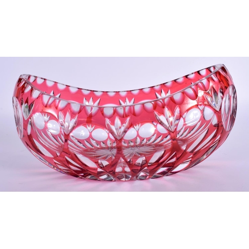 57 - A PAIR OF BOHEMIAN BLUE FLASH DECANTERS with stoppers  together with a vase & bells. Largest 34 cm h... 