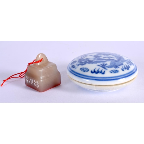 60 - AN EARLY 20TH CENTURY CHINESE CARVED SOAPSTONE SEAL together with a paste box. (2)
