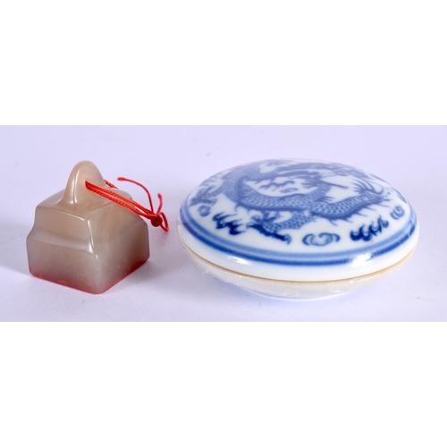 60 - AN EARLY 20TH CENTURY CHINESE CARVED SOAPSTONE SEAL together with a paste box. (2)