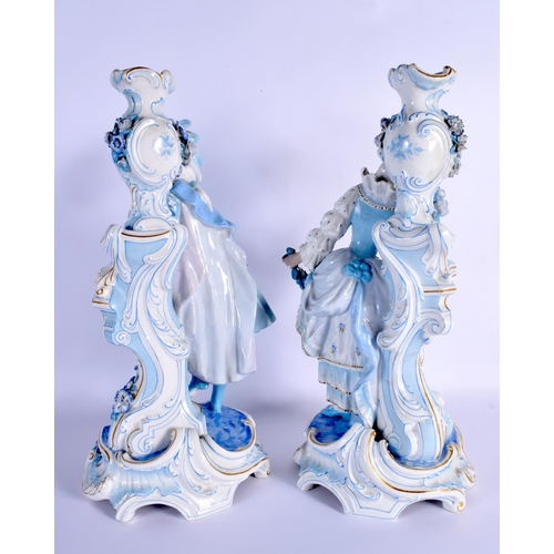8 - A GOOD LARGE PAIR OF 19TH CENTURY GERMAN BLUE AND WHITE PORCELAIN FIGURES modelled as a female and f... 