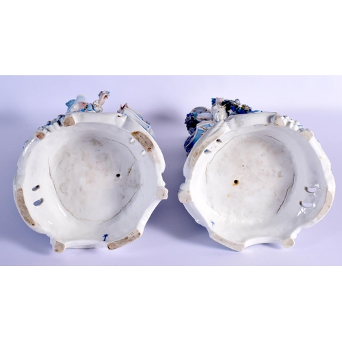 8 - A GOOD LARGE PAIR OF 19TH CENTURY GERMAN BLUE AND WHITE PORCELAIN FIGURES modelled as a female and f... 