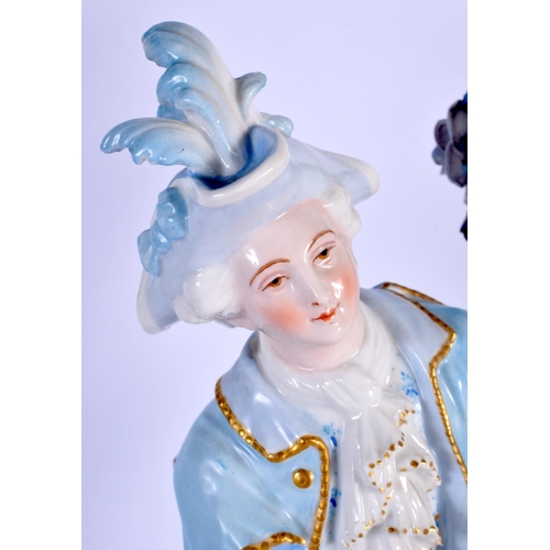 8 - A GOOD LARGE PAIR OF 19TH CENTURY GERMAN BLUE AND WHITE PORCELAIN FIGURES modelled as a female and f... 