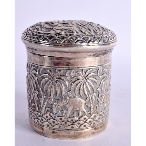 AN INDIAN WHITE METAL BOX AND COVER decorated with elephants. 119 grams