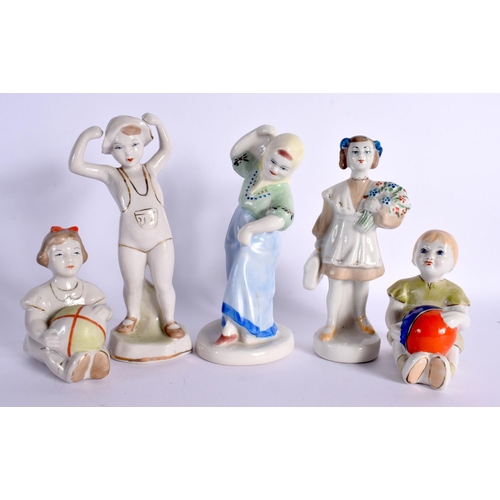 107 - A COLLECTION OF FIFTEEN UKRAINIAN PORCELAIN FIGURES in various forms and sizes. Largest 25 cm high. ... 