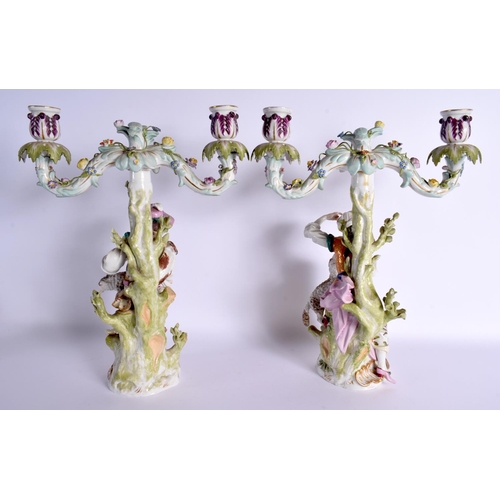 118 - A PAIR OF 19TH CENTURY AUGUSTUS REX PORCELAIN FIGURAL CANDLESTICKS. 35 cm x 18 cm.