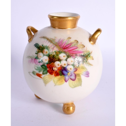 150 - Royal Worcester spherical vase with two handles and three ball feet painted with heathers and other ... 