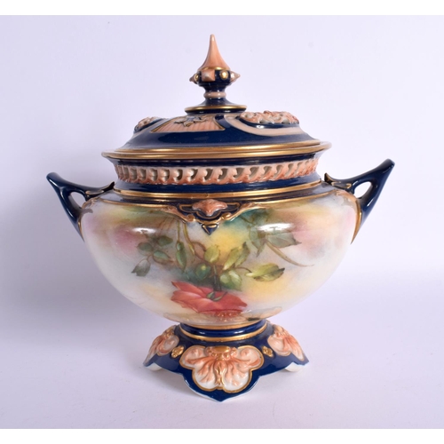 159 - Royal Worcester Hadleyware pot pourri vase and cover with dark blue handles and cover, painted with ... 