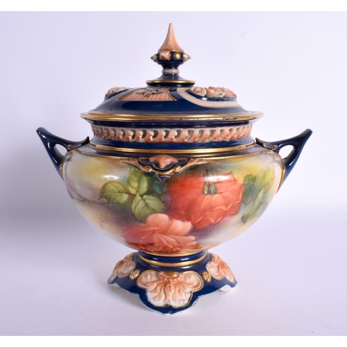 159 - Royal Worcester Hadleyware pot pourri vase and cover with dark blue handles and cover, painted with ... 