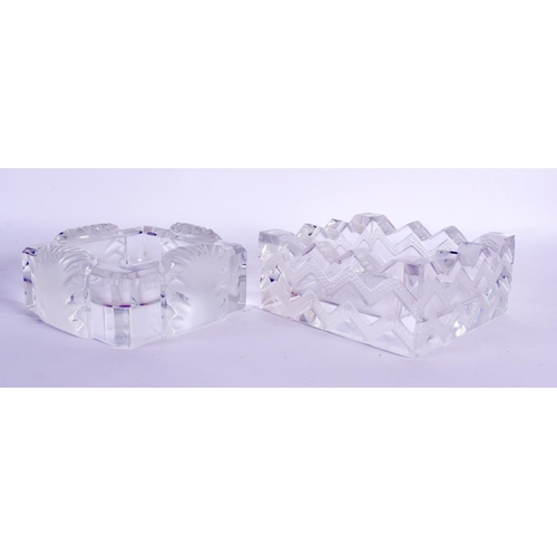 164 - A PAIR OF FRENCH LALIQUE GLASS DISHES. Largest 11 cm square.