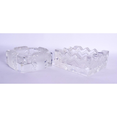 164 - A PAIR OF FRENCH LALIQUE GLASS DISHES. Largest 11 cm square.