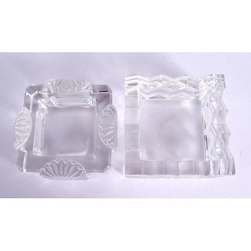 164 - A PAIR OF FRENCH LALIQUE GLASS DISHES. Largest 11 cm square.