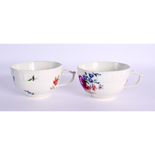 171 - 18th c. Berlin teacups and saucers, painted with colourful flowers below an ozier moulded border, sc... 