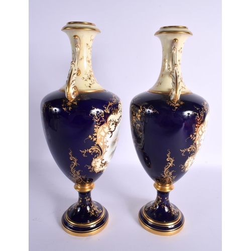 174 - Early 20th century Coalport pair of landscape vases painted by P. Simpson. Signed. 32.5cm High