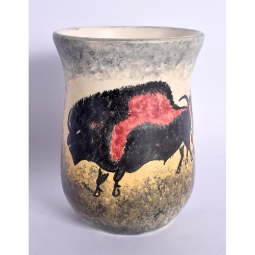 18 - AN UNUSUAL FRENCH PORCELAIN BEAKER painted with bison. 12 cm high.