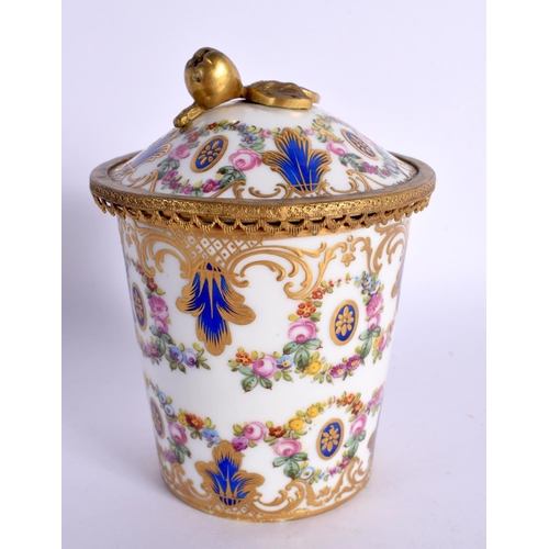 181 - 19th century Sevres style  porcelain gilt metal mounted beaker and cover finely painted with flowers... 