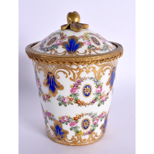 181 - 19th century Sevres style  porcelain gilt metal mounted beaker and cover finely painted with flowers... 