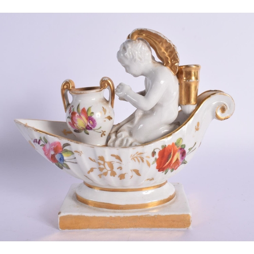 183 - 19th century Paris porcelain inkwell modelled with a winged cherub seated before a two handled vase ... 