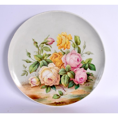 189 - 19th century English pottery plaque painted with flowers by T, Simpson, signed T.S. 26cm Diameter