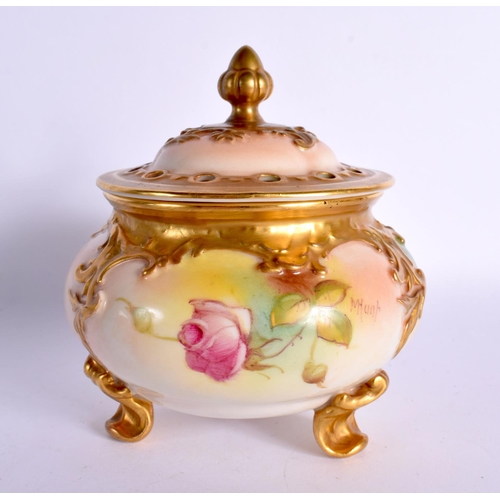 195 - Royal Worcester pot pourri vase on three feet painted with roses by M. Hunt,signed. 12cm High