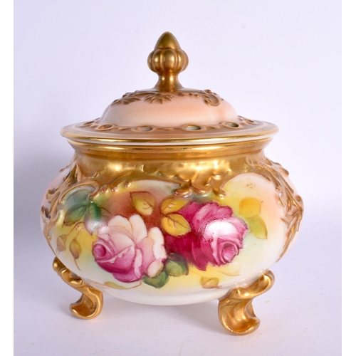 195 - Royal Worcester pot pourri vase on three feet painted with roses by M. Hunt,signed. 12cm High