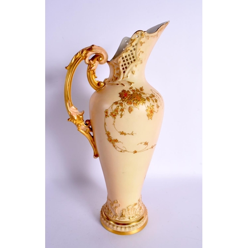 198 - Royal Worcester fine large Empress ewer gilded and painted with flowers on a blush ivory ground, sha... 