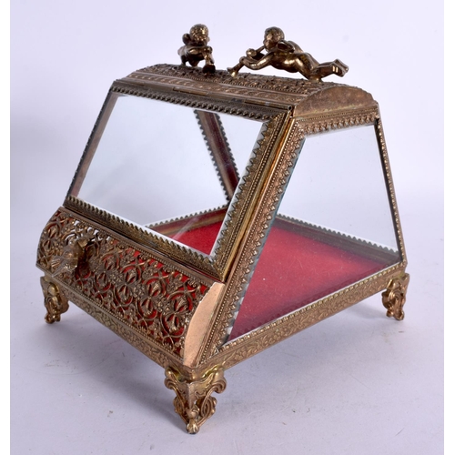 238 - AN EARLY 20TH CENTURY FRENCH GILT METAL CRYSTAL GLASS JEWELLERY BOX. 15 cm x 18 cm.