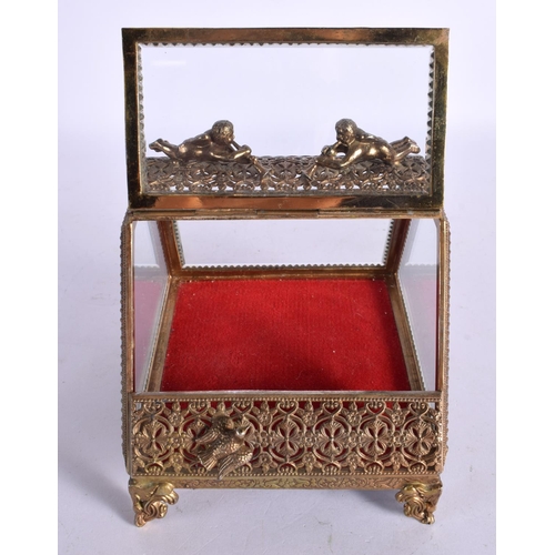 238 - AN EARLY 20TH CENTURY FRENCH GILT METAL CRYSTAL GLASS JEWELLERY BOX. 15 cm x 18 cm.