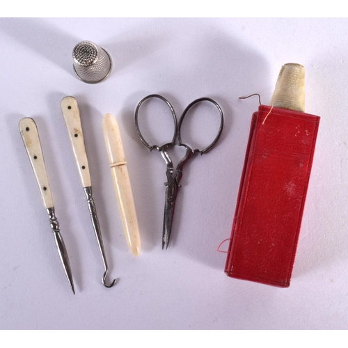 239 - A REGENCY LEATHER AND GILT METAL ETUI containing bone and white metal utensils. 9 cm x 5 cm.