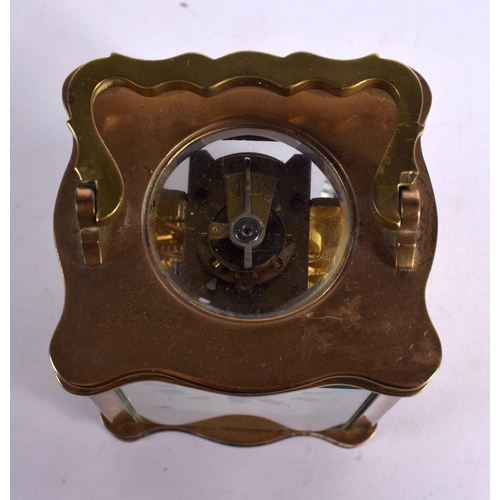 240 - A FRENCH BRASS CARRIAGE CLOCK. 15 cm high inc handle.